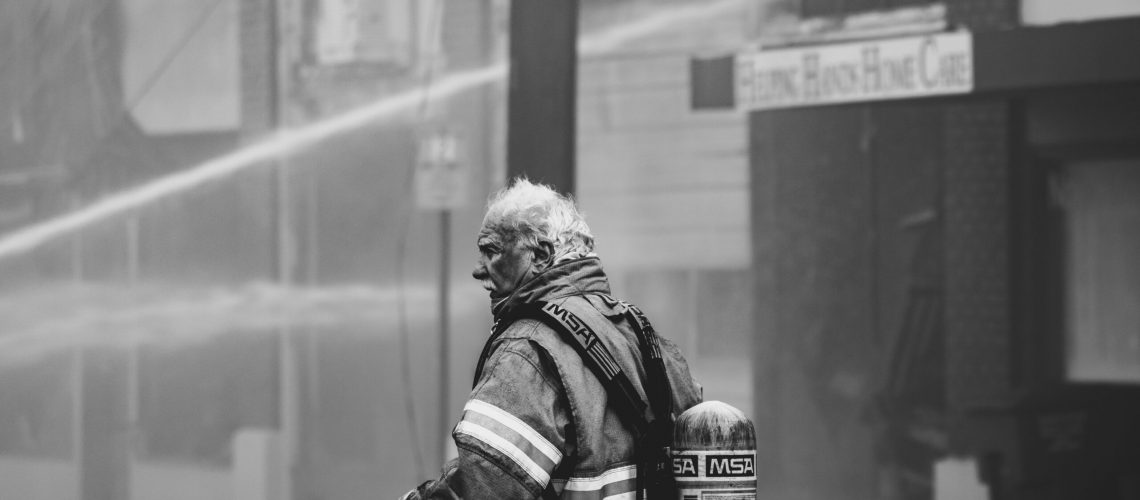 grayscale-photo-of-firefighter-3013675
